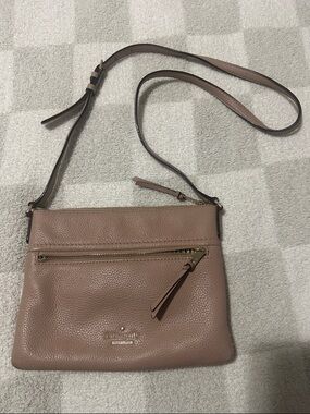 Kate Spade Pebbled Leather Crossbody in Taupe with Gold Hardware.